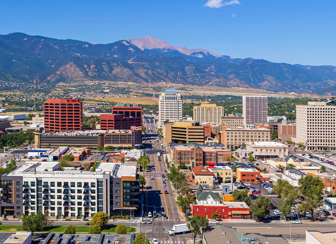 Loveland, CO - Aerial of Downtown Colorado Springs With Pikes Peak in the Background